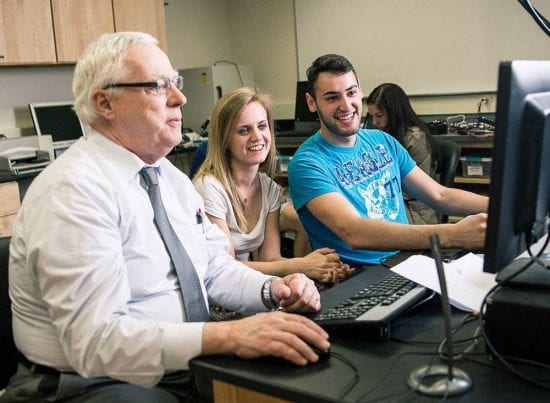 Dr. Mecca with students
