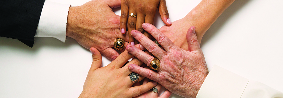 Alumni hands with rings