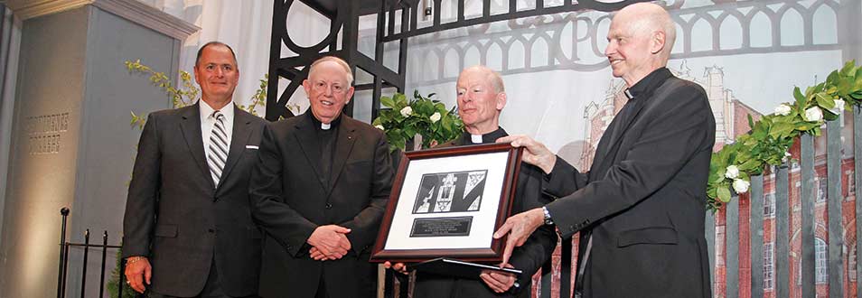 Presentation of the Black & White Award to college president Fr. Shanley '80, O.P.